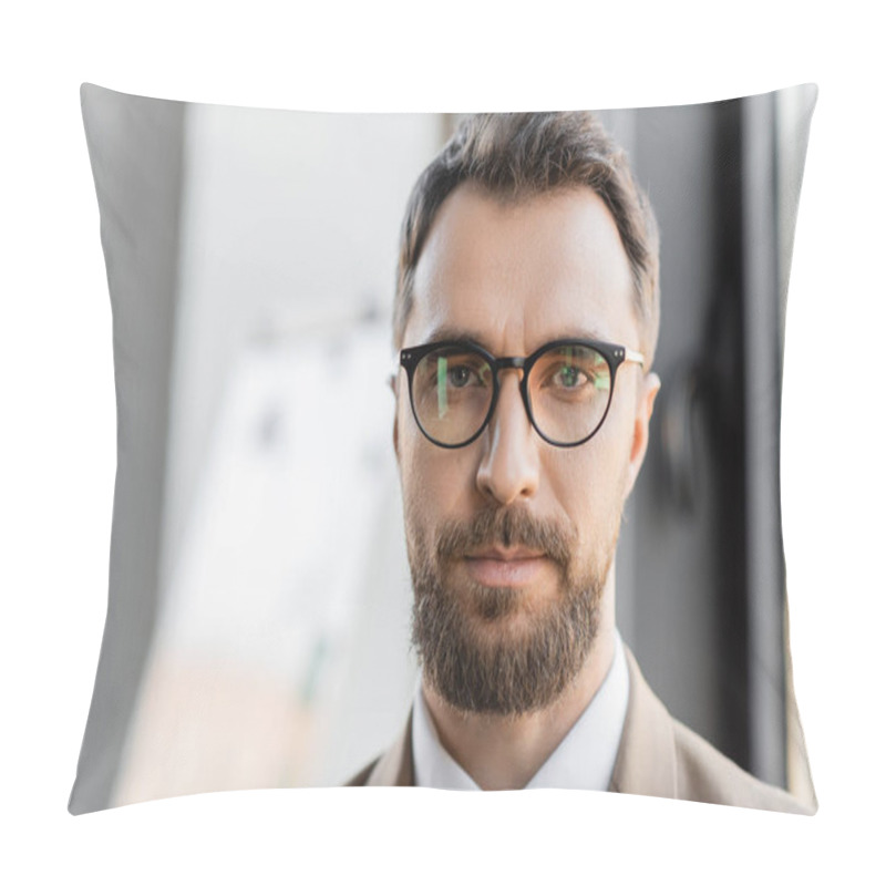 Personality  Portrait Of Brunette And Bearded Successful Businessman In Eyeglasses And Stylish Formal Wear Looking At Camera In Modern Office On Blurred Background Pillow Covers