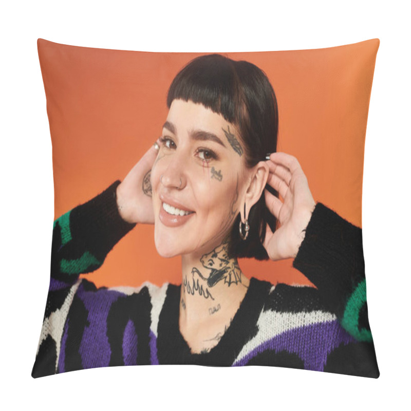 Personality  A Young Woman With Intricate Tattoos Smiles And Poses Playfully In A Vibrant Sweater, Radiating Style. Pillow Covers