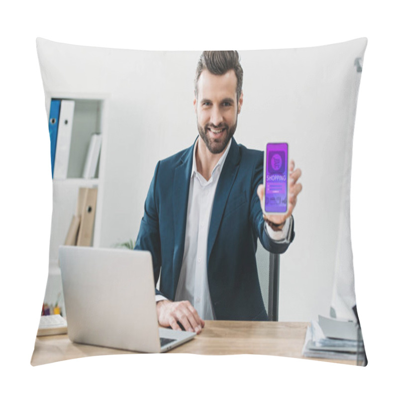 Personality  Businessman At Table With Laptop And Showing Smartphone With Shopping App On Screen In Office Pillow Covers