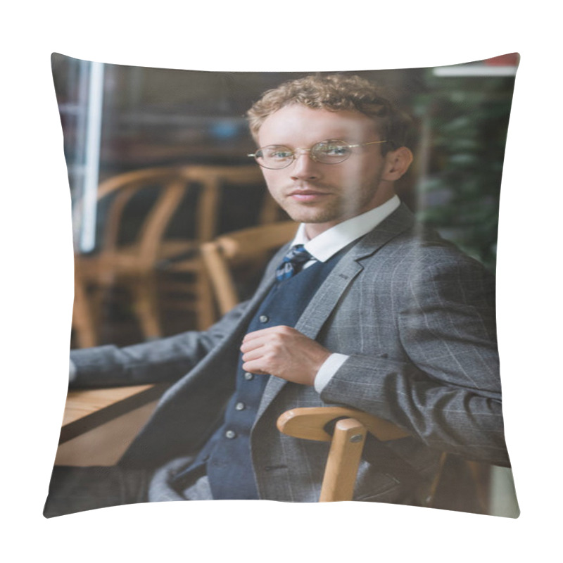 Personality  Curly Businessman In Glasses Looking At Camera Through Blurred Window In Cafe Pillow Covers