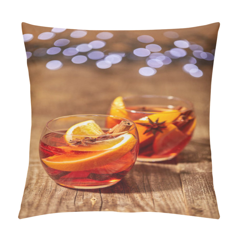 Personality  Close Up View Of Mulled Wine In Glasses With Orange Pieces And Spices On Wooden Surface With Bokeh Lights On Backdrop Pillow Covers