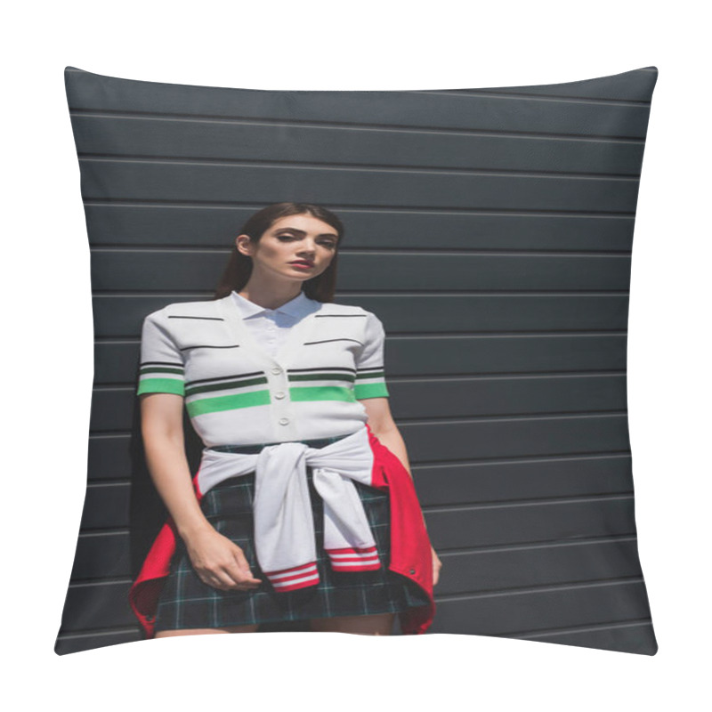 Personality  Pretty Woman In Striped Polo T-shirt Looking At Camera While Leaning On Grey Wall Pillow Covers