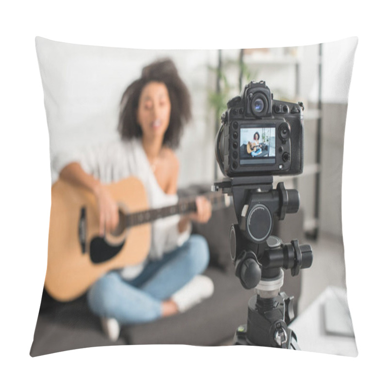 Personality  Selective Focus Of Digital Camera With Young African American Girl In Braces Playing Acoustic Guitar And Singing On Display  Pillow Covers