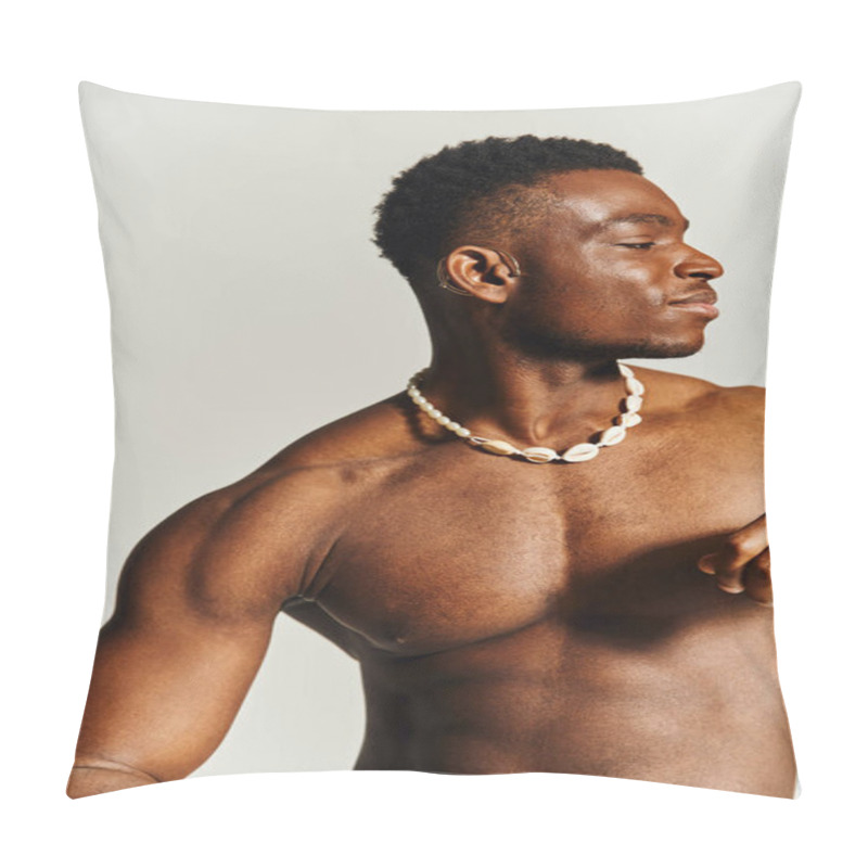 Personality  In A Stylish Indoor Environment, A Young African American Man Showcases His Toned Physique While Wearing A Decorative Necklace. Pillow Covers