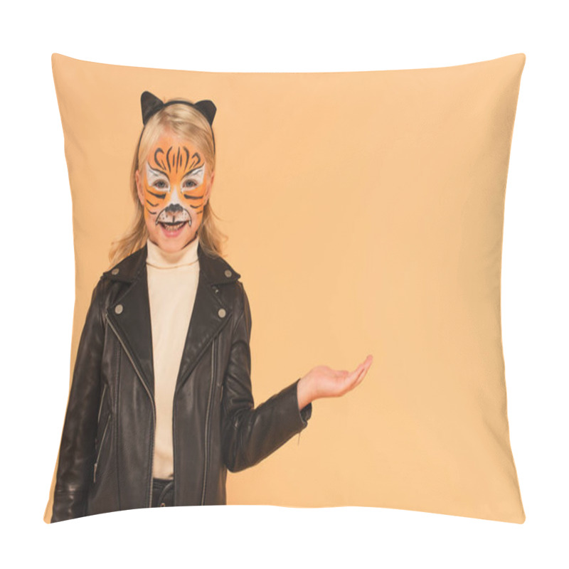 Personality  Cheerful Girl In Tiger Makeup Standing With Open Palm Isolated On Beige Pillow Covers