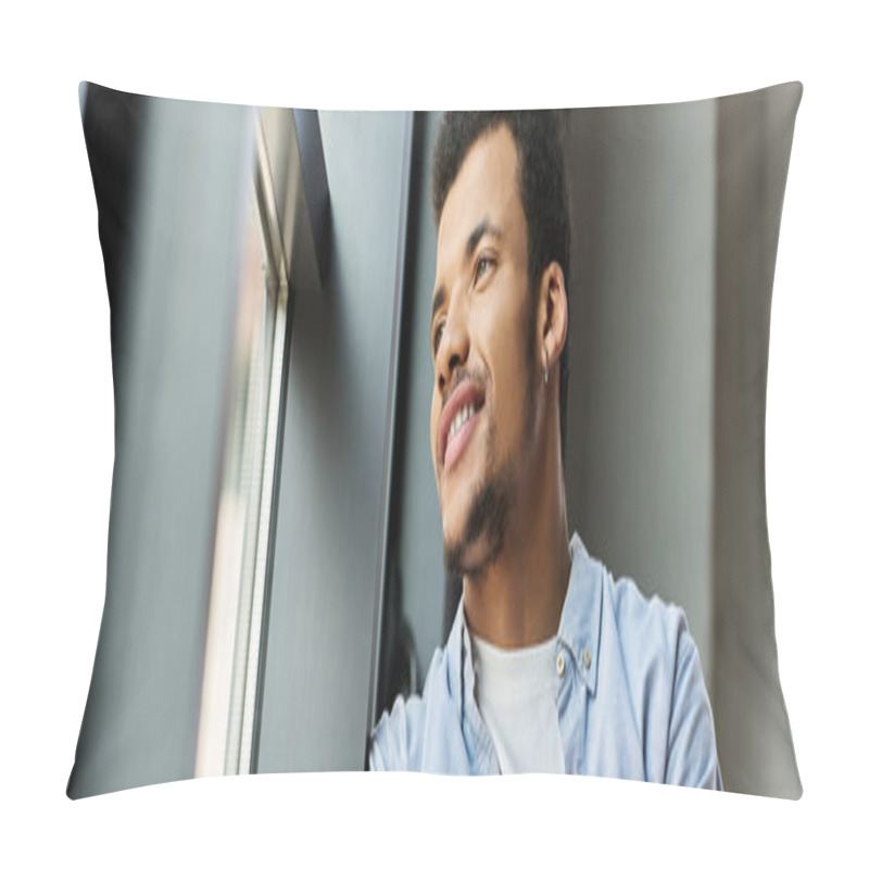 Personality  Young Man Leans By The Window, Smiling While Contemplating His Thoughts In A Warm Atmosphere. Pillow Covers