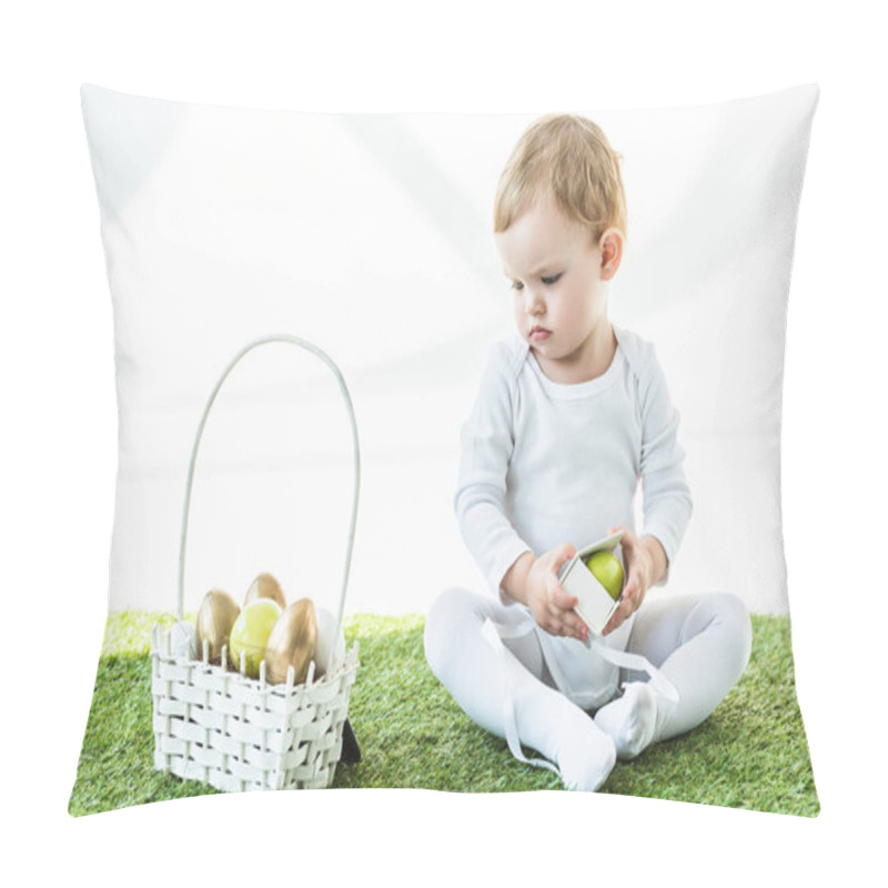 Personality  Adorable Kid Holding Box With Yellow Egg While Sitting Near Straw Basket With Easter Eggs Isolated On White Pillow Covers