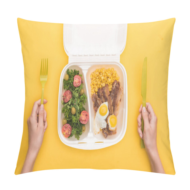 Personality  Cropped View Of Woman Holding Plastic Fork, Knife And Eco Package With Corn, Meat, Fried Eggs And Salad Isolated On Yellow  Pillow Covers