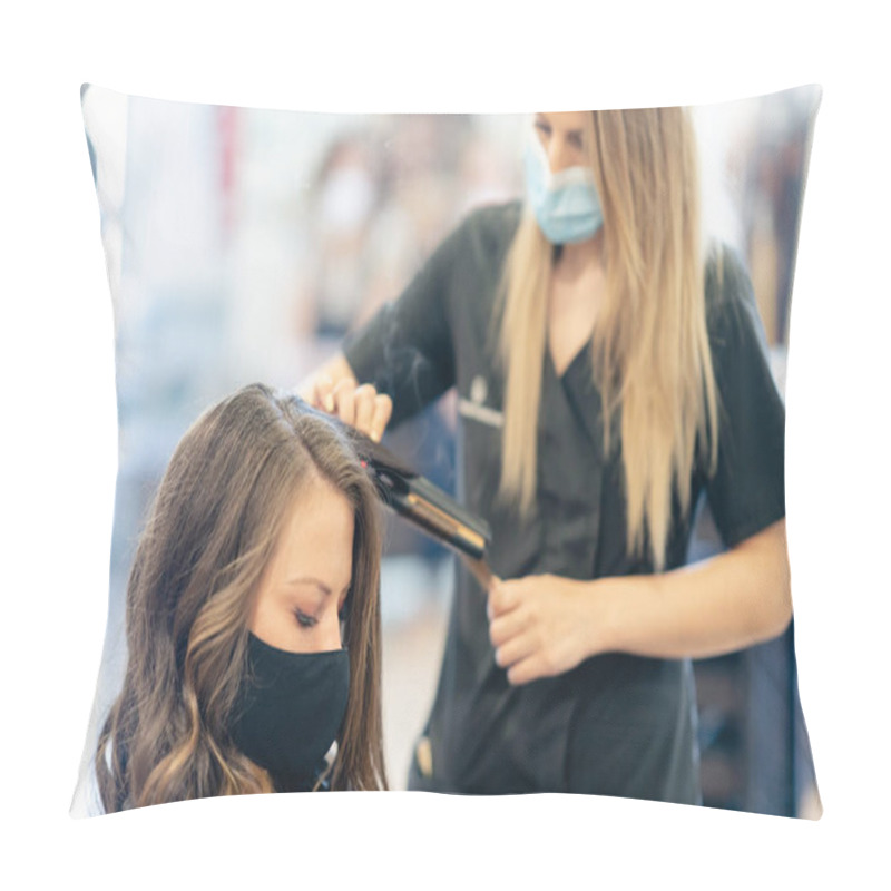 Personality  Hairdresser, Protected By A Mask, Combing Her Clients Hair With A Hair Iron In A Salon. Pillow Covers