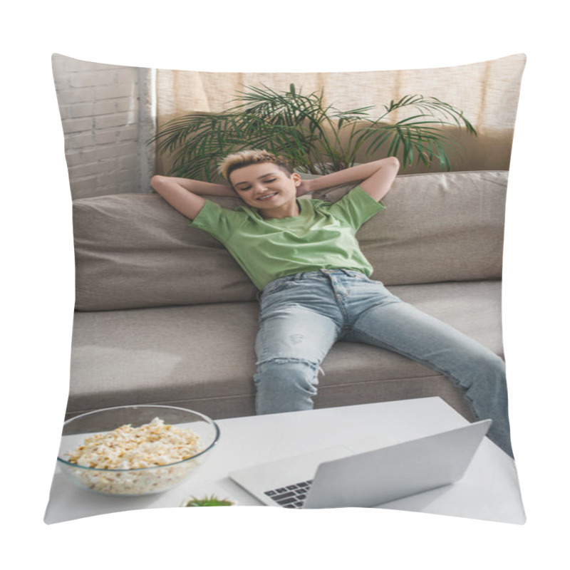 Personality  Happy Bigender Person Relaxing On Sofa And Watching Movie On Laptop Near Bowl Of Popcorn Pillow Covers