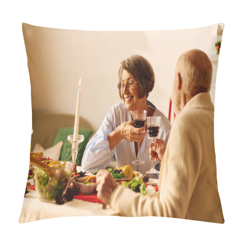 Personality  A Senior Couple Celebrates Christmas At Home, Toasting With Drinks And Enjoying A Festive Meal. Pillow Covers