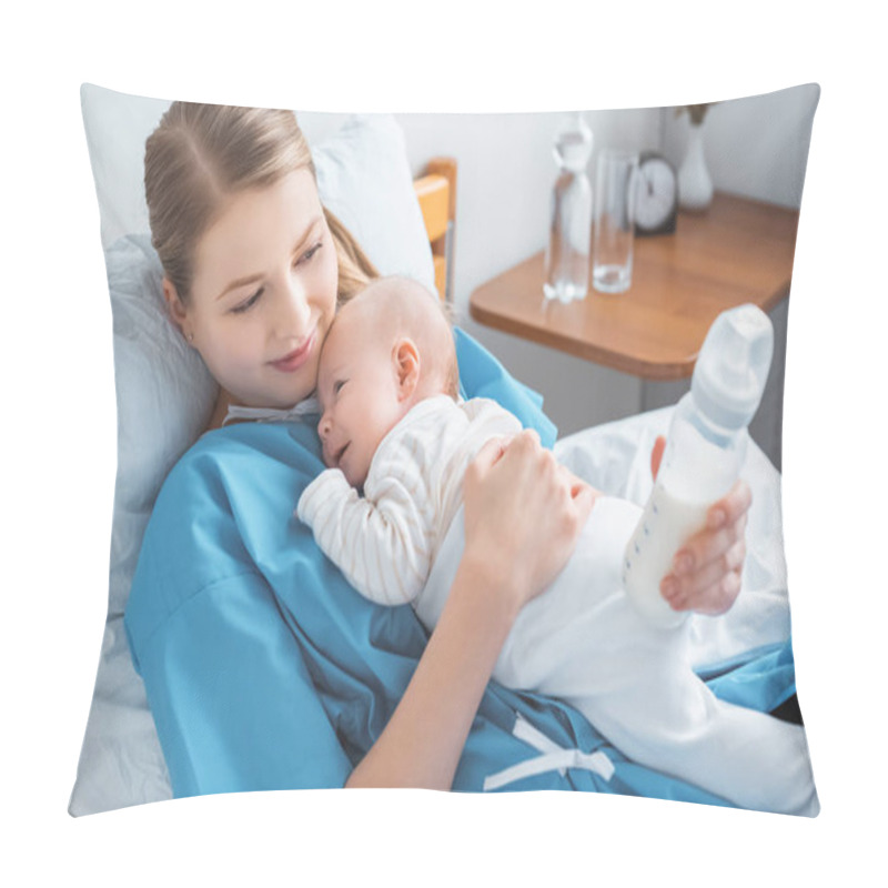 Personality  High Angle View Of Smiling Young Mother Holding Baby Bottle With Milk And Lying In Bed With Adorable Baby Pillow Covers