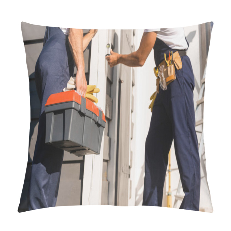 Personality  Cropped View Of Builder Holding Toolbox And Gloves Near Colleague With Spirit Level And Building  Pillow Covers