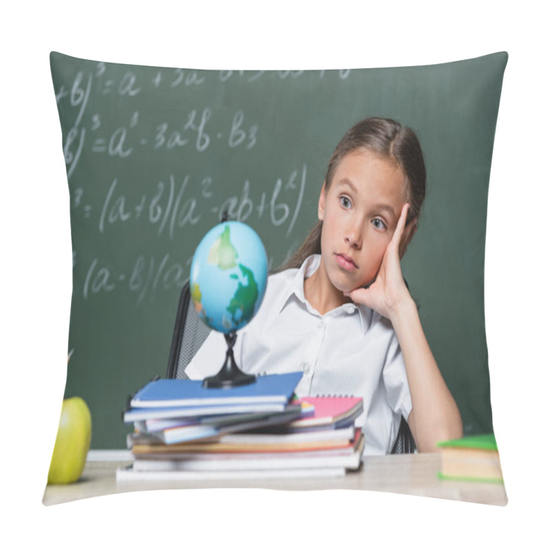 Personality  Thoughtful Schoolgirl Looking At Globe Near Notebooks And Chalkboard On Blurred Background Pillow Covers