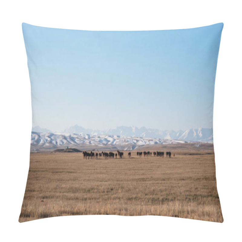 Personality  A Tranquil Expanse Of Golden Grassland Stretches Towards Snow-capped Mountain Peaks Under A Clear Blue Sky, Herd Of Horses Grazing Peacefully, Embodying The Serene Essence Of A Pastoral Landscape. Pillow Covers