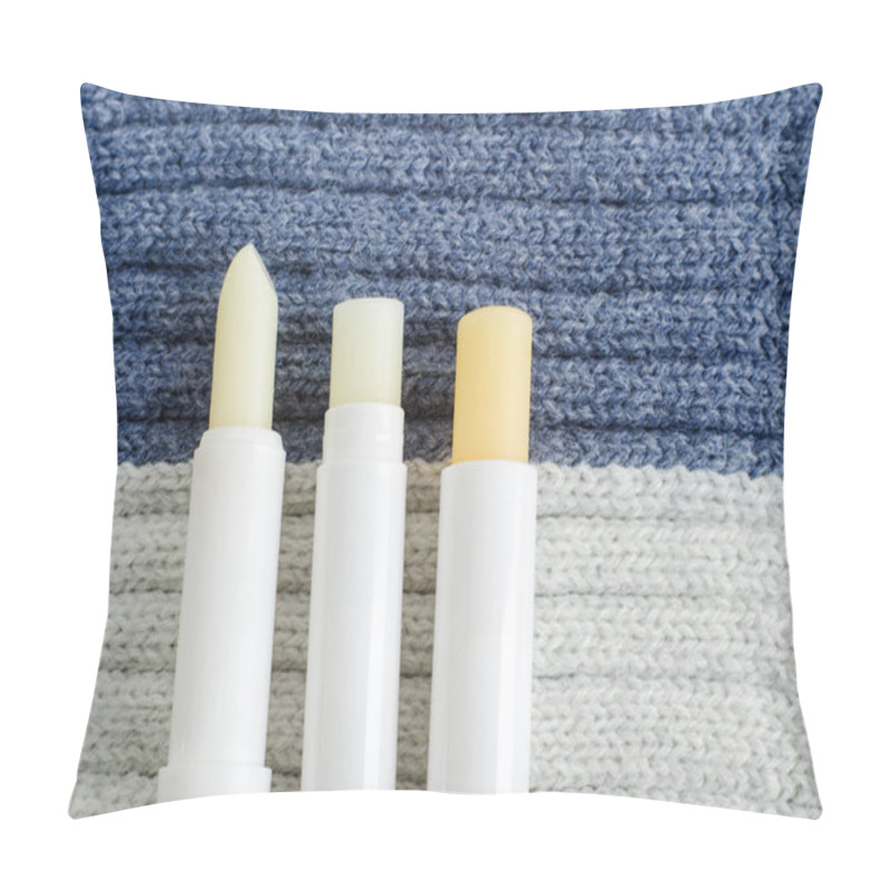 Personality  Three Lip Balms On The Knitted Background. Winter Lip Care Sticks With Beeswax, Honey, Panthenol And Shea Butter. Copy Space.  Pillow Covers