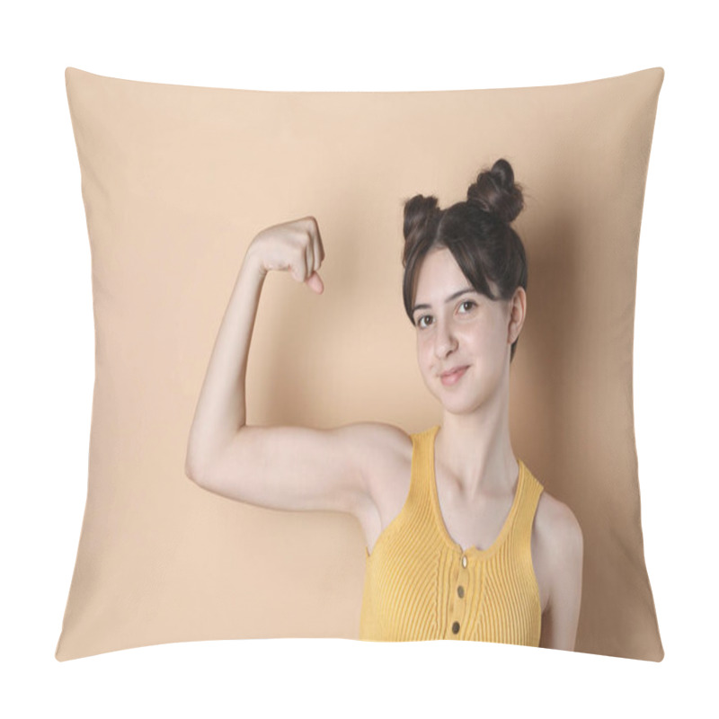 Personality  Portrait Of Cute Teenage Girl Showing Muscles On Beige Background. Space For Text Pillow Covers