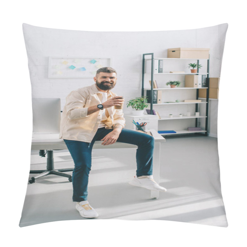 Personality  Smiling Businessman Sitting On Office Desk And Holding Disposable Cup Pillow Covers