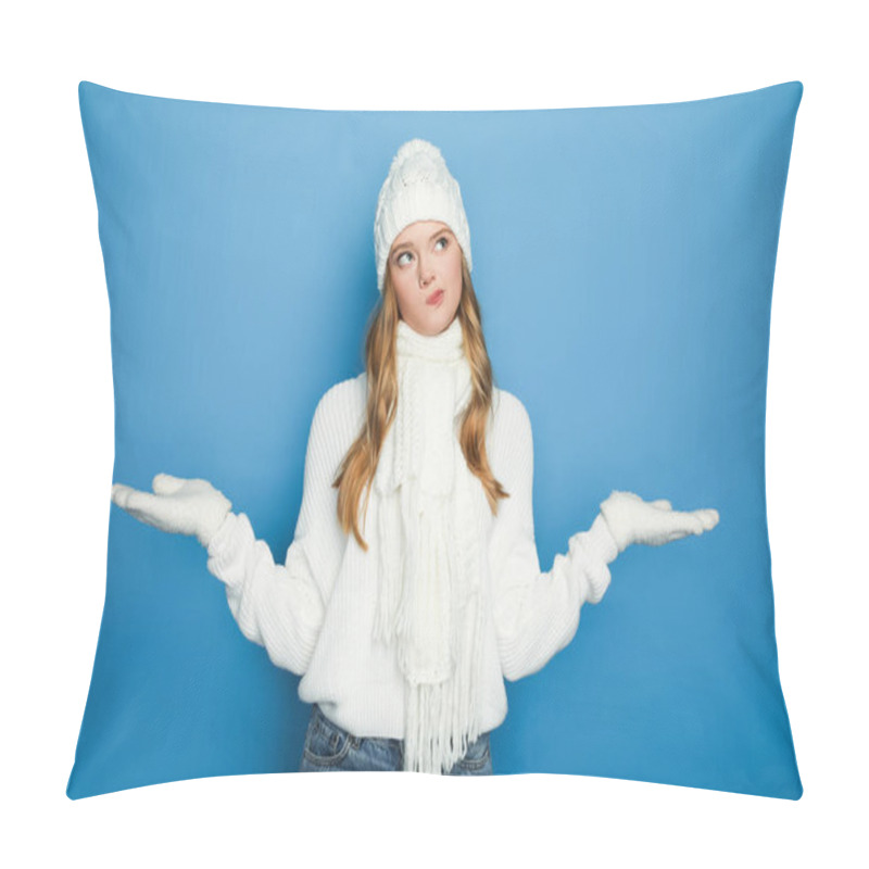 Personality  Confused Beautiful Woman In Winter White Outfit Showing Shrug Isolated On Blue Pillow Covers