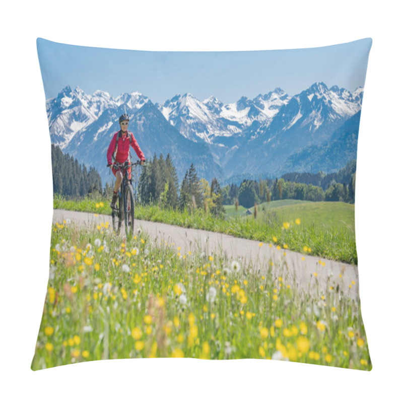 Personality  Pretty Senior Woman Riding Her Electric Mountain On Warm Spring Day With Snoe Capped Bike In The Iller Valley Near Oberstdorf With Snoe Capped Allgau High Alps In Background, Allgau Alps, Bavaria,  Pillow Covers