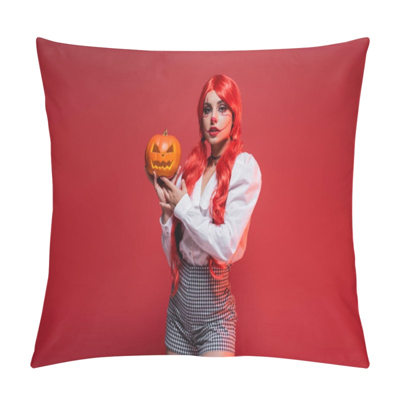 Personality  Woman With Bright Ponytails And Clown Makeup Holding Carved Pumpkin Isolated On Red Pillow Covers