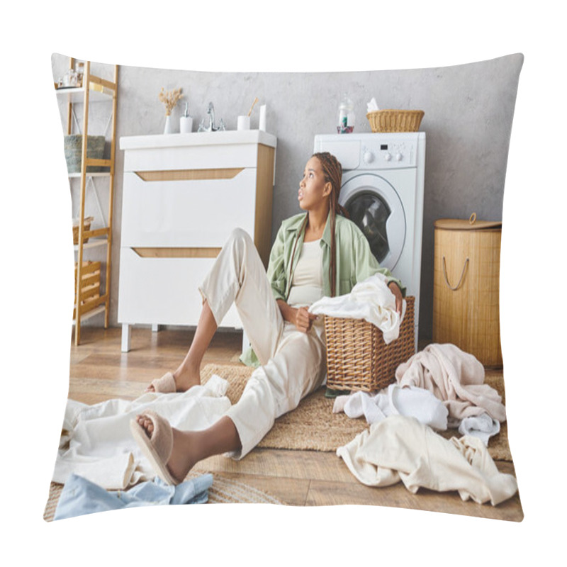 Personality  An African American Woman With Afro Braids Sitting On The Floor In Front Of A Washing Machine, Doing Laundry In The Bathroom. Pillow Covers