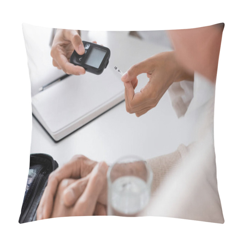 Personality  Cropped View Of African American Doctor Holding Glucometer Device And Test Strip Near Middle Aged Patient Pillow Covers