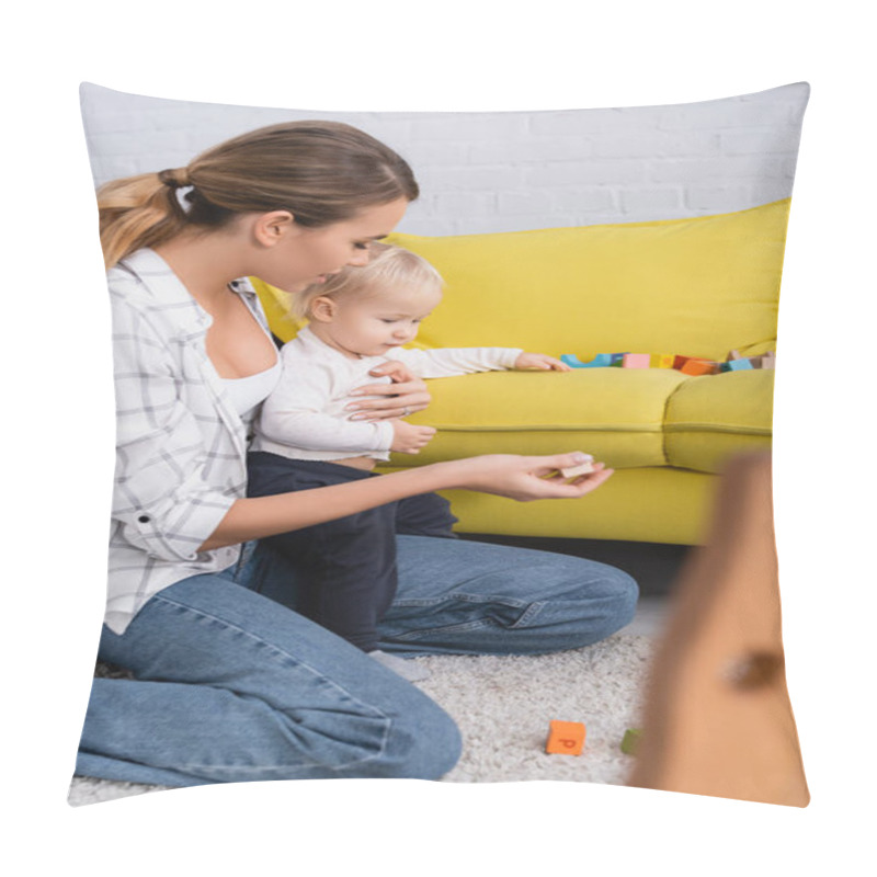 Personality  Mother Giving Toy Cube To Son While Playing On Floor On Blurred Foreground Pillow Covers