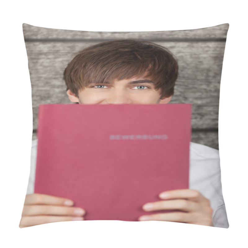 Personality  Businessman Holding Application File Against Wooden Wall Pillow Covers