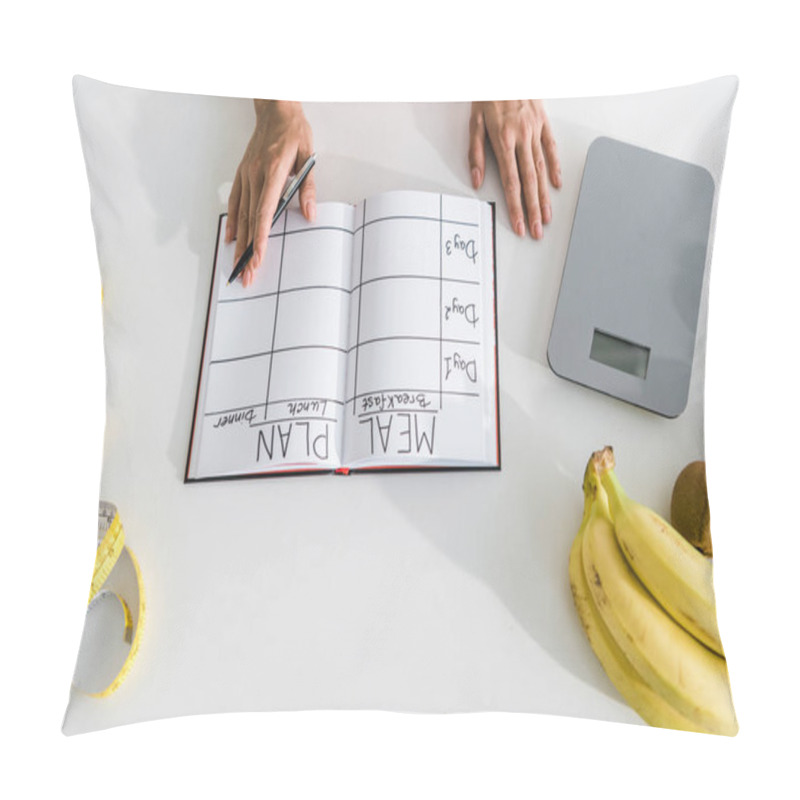 Personality  Cropped View Of Woman Holding Pen Near Notebook And Fruits  Pillow Covers