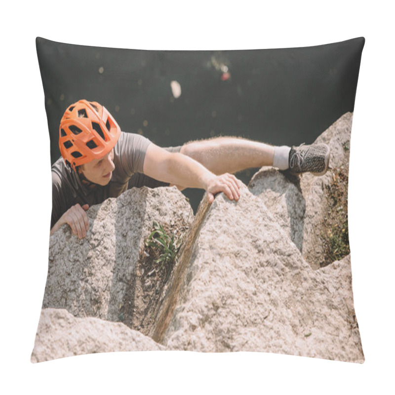 Personality  High Angle View Of Focused Male Hiker In Protective Helmet Climbing On Rocks  Pillow Covers