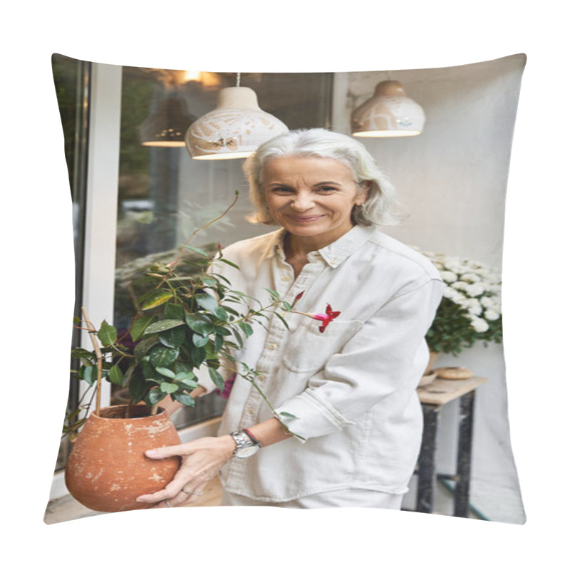 Personality  A Lovely Woman Enjoys Gardening While Holding A Potted Plant Outside Her Quaint Home. Pillow Covers