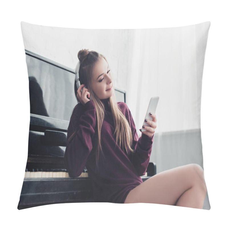 Personality  Attractive Girl With Headphones On Head Sitting In Front Of Piano And Using Smartphone At Home Pillow Covers