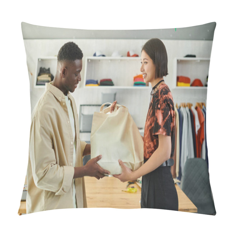 Personality  Smiling Asian Designer Giving Canvas Shopping Bag To African American Colleague In Print Studio Pillow Covers