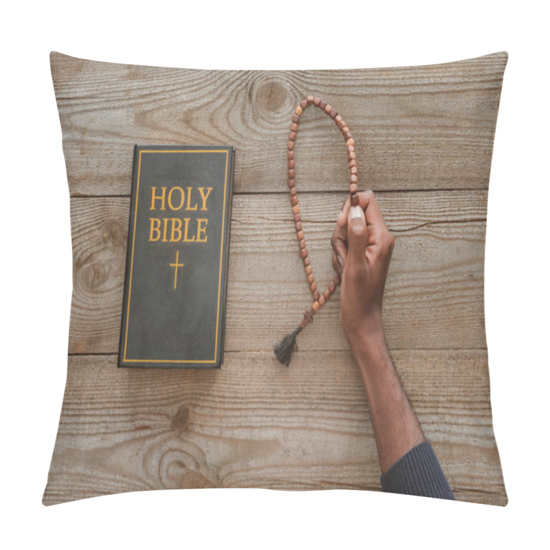 Personality  Cropped Shot Of African American Man Holding Beads Near Holy Bible On Wooden Table Pillow Covers