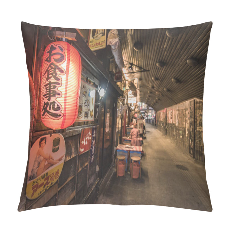 Personality  Tokyo, Japan - August 25,2019: Night View Of The Yuraku Concourse Underpass Under The Railway Line Of The Station Yurakucho. Japanese Noodle Stalls And Sake Bars Revive The Nostalgic Years Of Showa Air With Old Posters Glued To The Tunnel. Pillow Covers