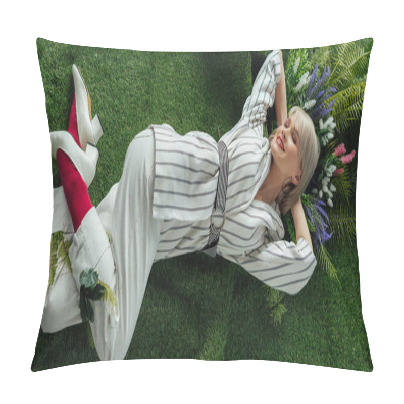 Personality  Panoramic Shot Of Beautiful Stylish Girl Smiling While Lying On Artificial Grass With Flowers  Pillow Covers