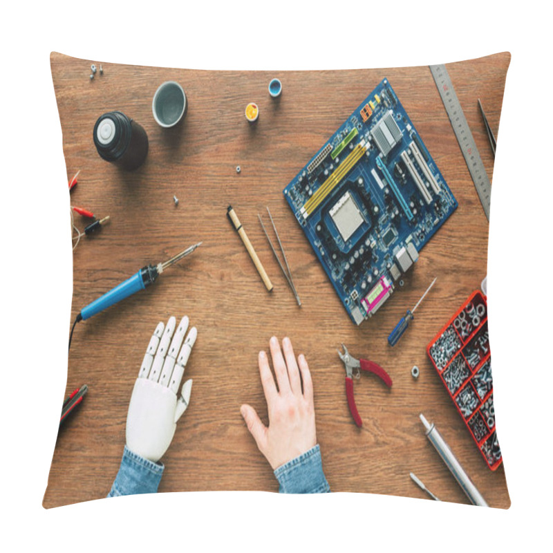 Personality  Cropped Image Of Man With Prosthetic Arm Sitting At Table With Instruments  Pillow Covers