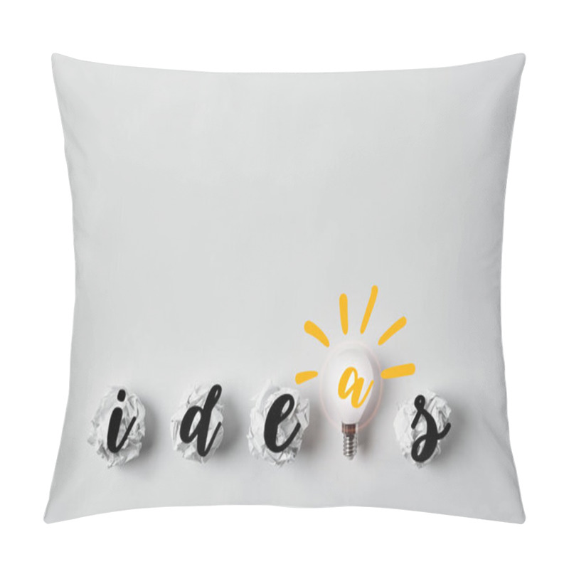 Personality  Row Of Light Bulb With Crumpled Papers And Ideas Word On White Surface Pillow Covers