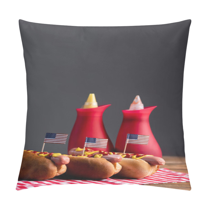 Personality  Blurred Sauce Bottles And Hot Dogs With Small American Flags On Plaid Table Napkin Isolated On Grey Pillow Covers