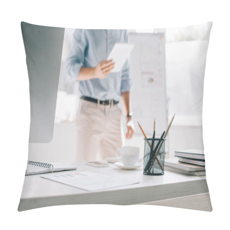 Personality  Cropped Image Of Architect Using Tablet In Office With Pen Holder On Foreground Pillow Covers