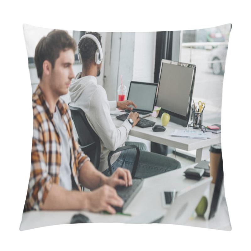 Personality  Selective Focus Of African American Programmer In Headphones Sitting At Workplace Near Colleague Pillow Covers