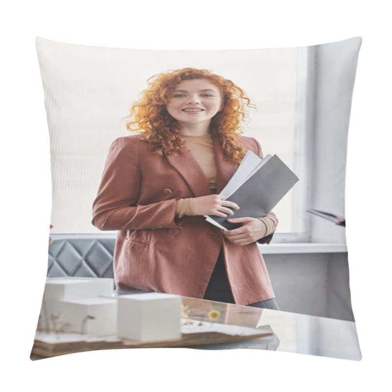 Personality  Portrait Of Redhead Architect With Documents Smiling At Camera Near Modern Building Model In Office Pillow Covers