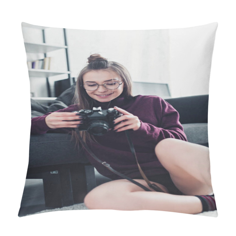 Personality  Attractive Photographer Smiling, Sitting On Floor Near Sofa And Holding Film Camera In Living Room Pillow Covers