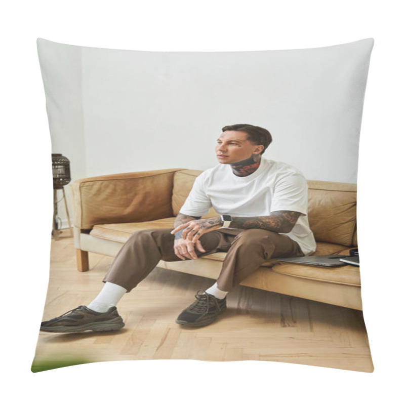 Personality  A Stylish Young Man Sits Comfortably On A Couch, Lost In Thought About Life Moments. Pillow Covers