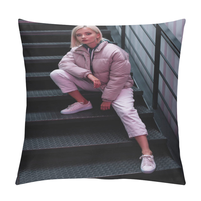 Personality  Blonde Girl In Down Jacket And Sneakers Sitting On Stairs And Looking At Camera Pillow Covers