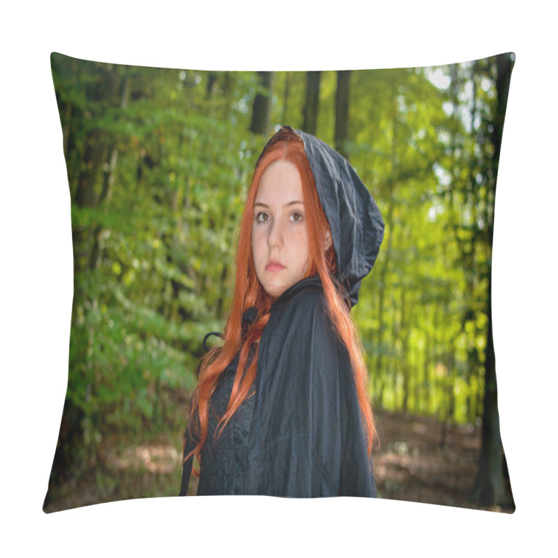 Personality  Beautiful Young Woman With Long Red Hair, With Black Hood-cape Stands In The Green Forest Pillow Covers