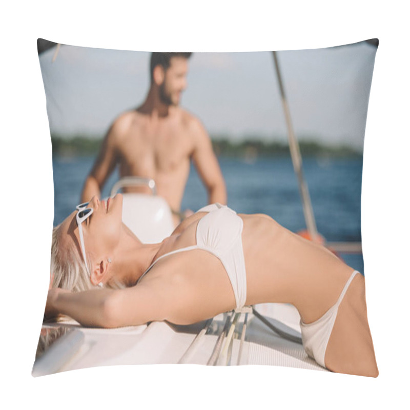 Personality  Selective Focus Of Attractive Young Woman In Bikini Having Sunbath While Her Boyfriend Steering Yacht  Pillow Covers