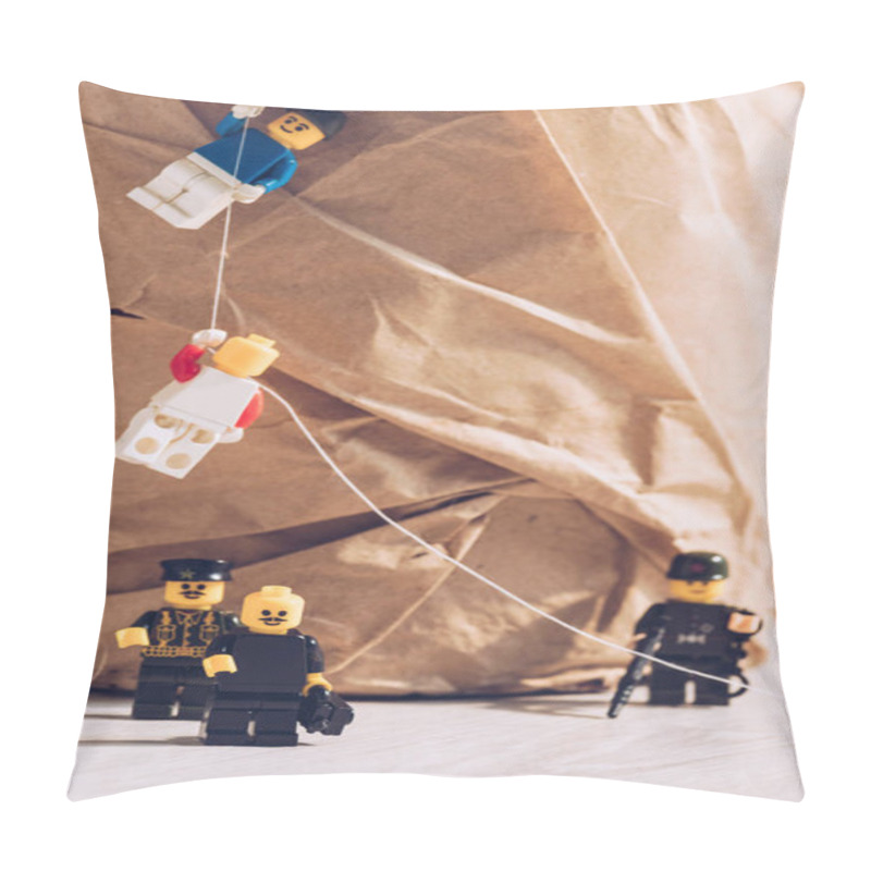 Personality  KYIV, UKRAINE - MARCH 15, 2019: Lego Policemen Standing With Weapon While Plastic Lego Figurines Climbing Rope  Pillow Covers