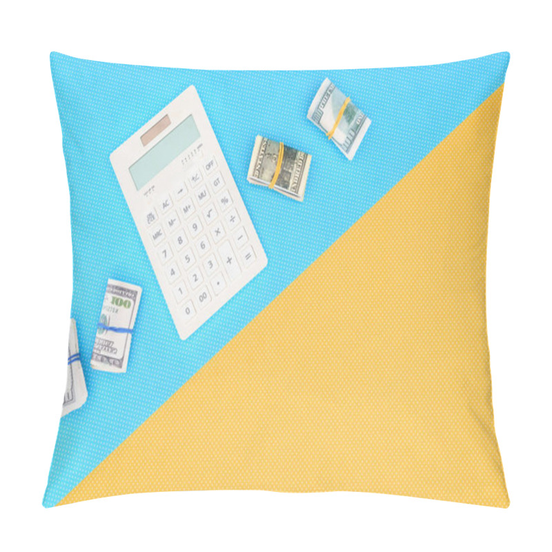 Personality  Top View Of Calculator And Money Rolls On Blue And Yellow Background Pillow Covers